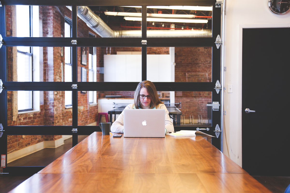 woman working on her laptop in the office