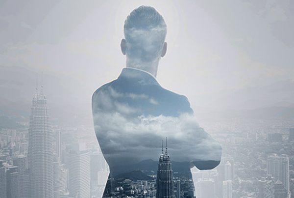 back of a man with arms crossed - transformational cmo