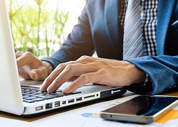 man working on laptop