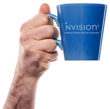 a hand holding NVISION mug - branded merchandise insight