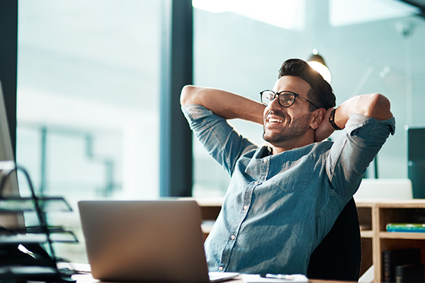 RFP guide Thumbnail -man relaxing at his desk