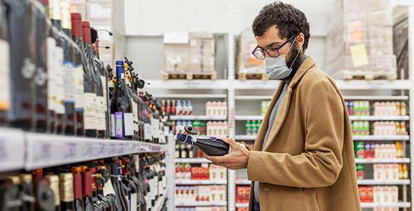 man shopping at the liquor store